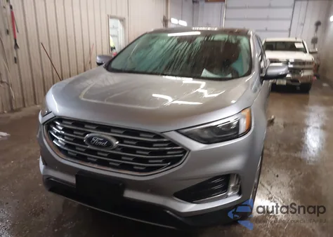 2022 Ford Edge Titanium z USA, uszkodzony, nr VIN 2FMPK4K91NBB07393